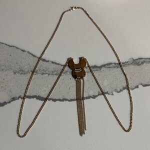 Elegant Gold-Tone Necklace with Tassel